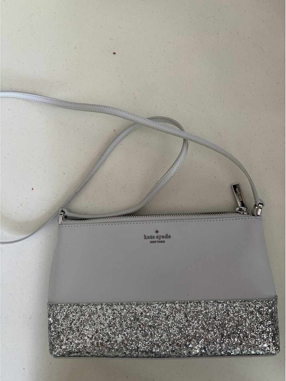 Kate Spade “New York Flash” Glitter Crossbody Bag In Gray And Silver